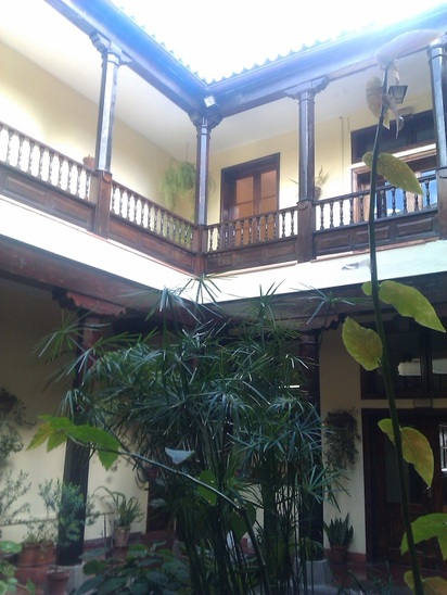 courtyard of old house in St Brigida, housing the Turismo